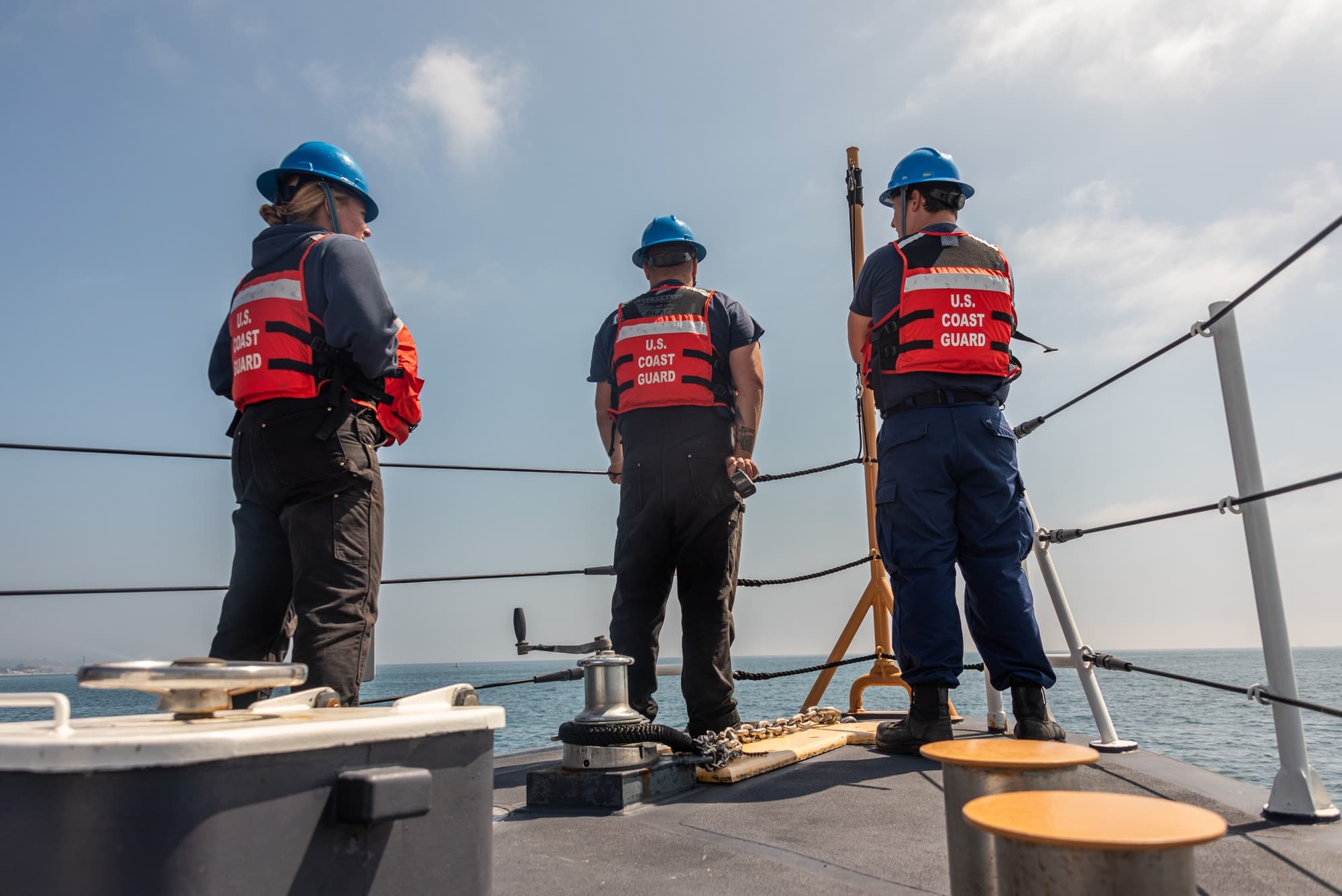 A Coast Guard cutter leaving port for maritime operations